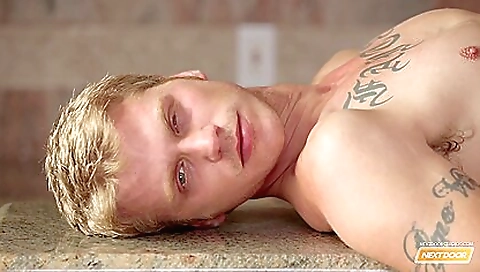 Sexy blonde babe fucks with her boyfriend in the kitchen